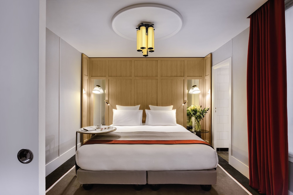 Suite Deluxe, 1 cama de matrimonio grande, 2 baños del hotel L'echiquier Opéra Paris Mgallery Collection. Foto 1