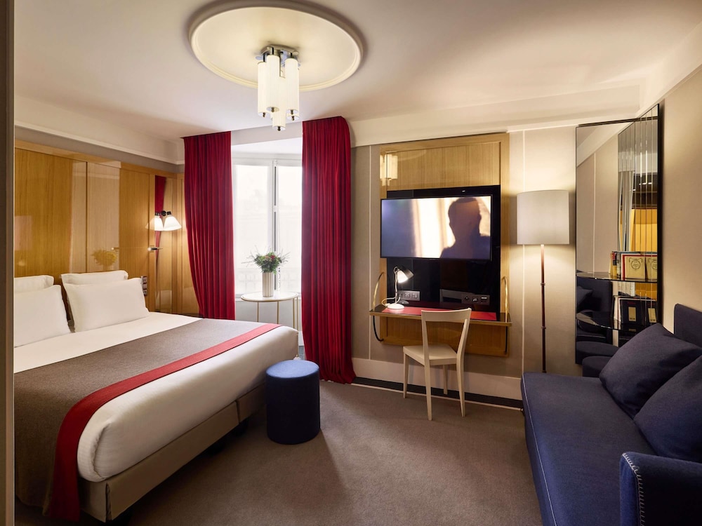 Suite junior, varias camas (Lounge) del hotel L'echiquier Opéra Paris Mgallery Collection