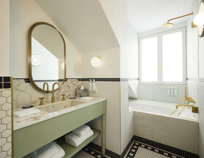 Suite Signature, 1 cama de matrimonio grande del hotel L'echiquier Opéra Paris Mgallery Collection. Foto 9