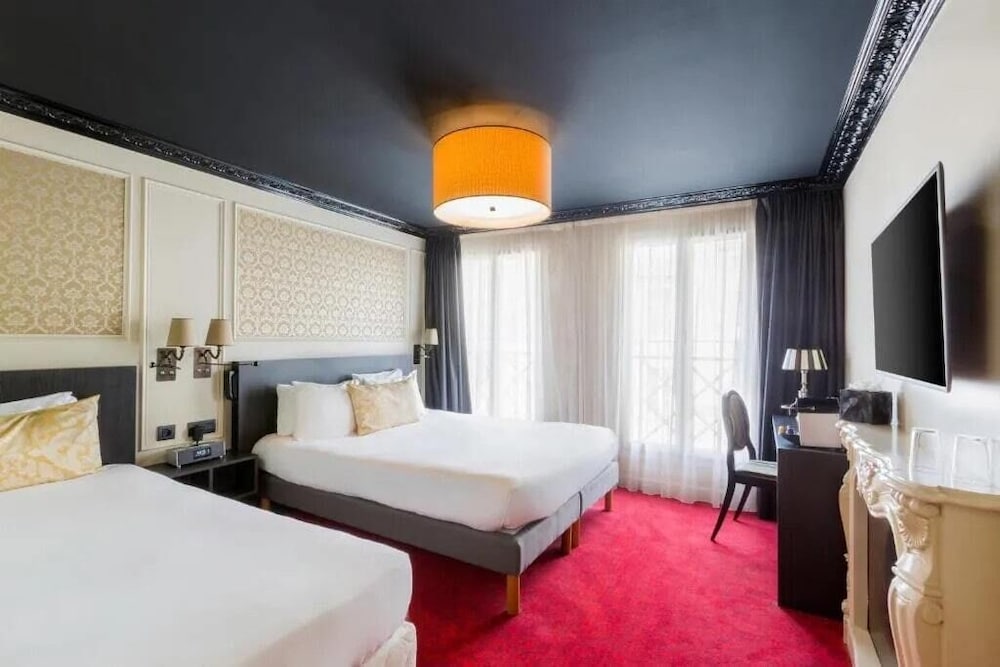 Habitación triple del hotel Le Montmartre Saint Pierre