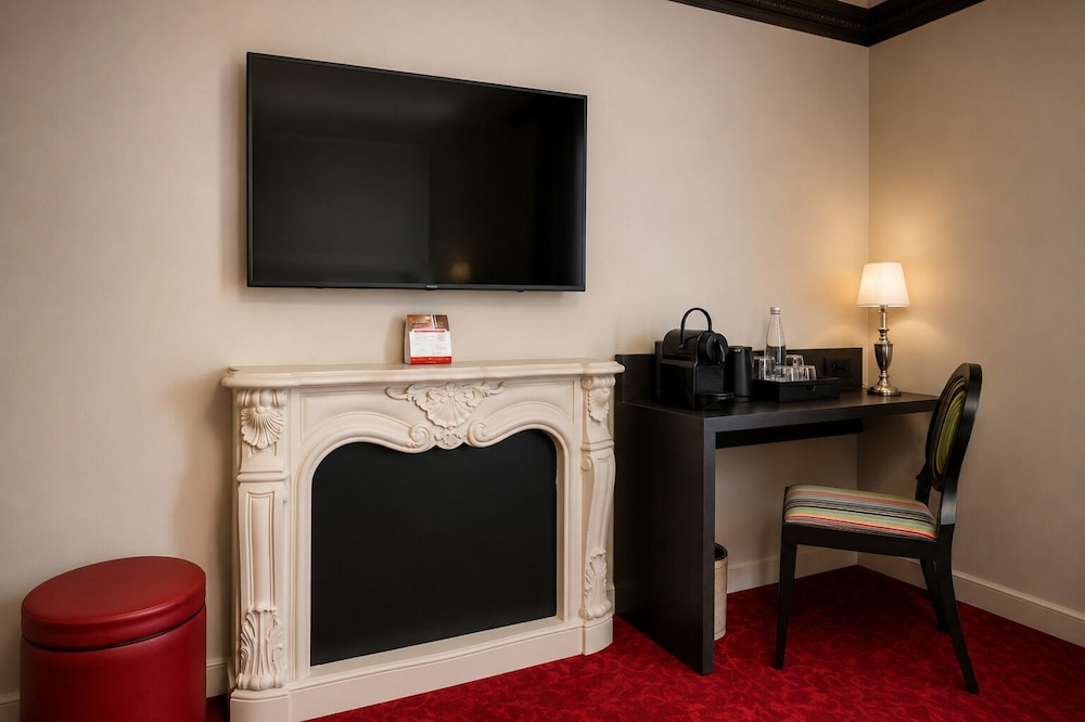 Habitación superior con 2 camas individuales del hotel Le Montmartre Saint Pierre. Foto 3