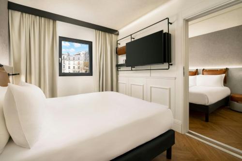 Connecting Queen and Twin Room del hotel Moxy Paris La Villette