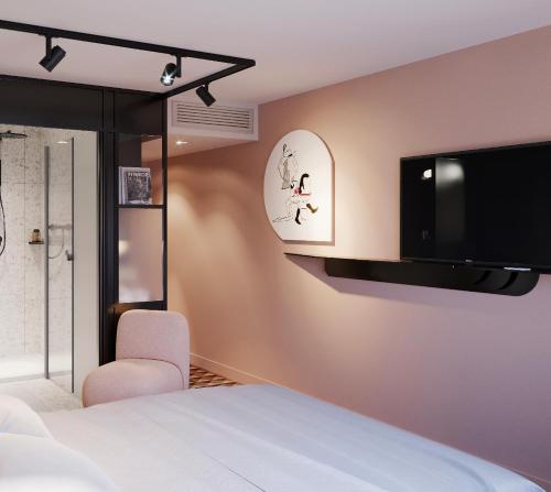 2 Habitaciones Contiguas - 1 cama doble y 2 camas individuales del hotel Tribe Paris Batignolles. Foto 2