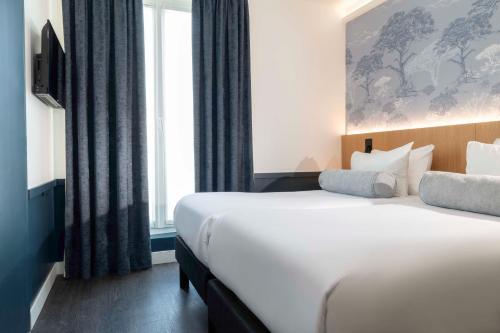 Habitación Twin Superior del hotel WYLD Saint Germain. Foto 6