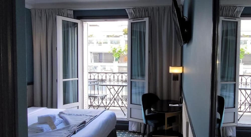 Habitación Club con 1 cama doble o 2 individuales, 1 habitación (avec balcon) del hotel Lenox Montparnasse