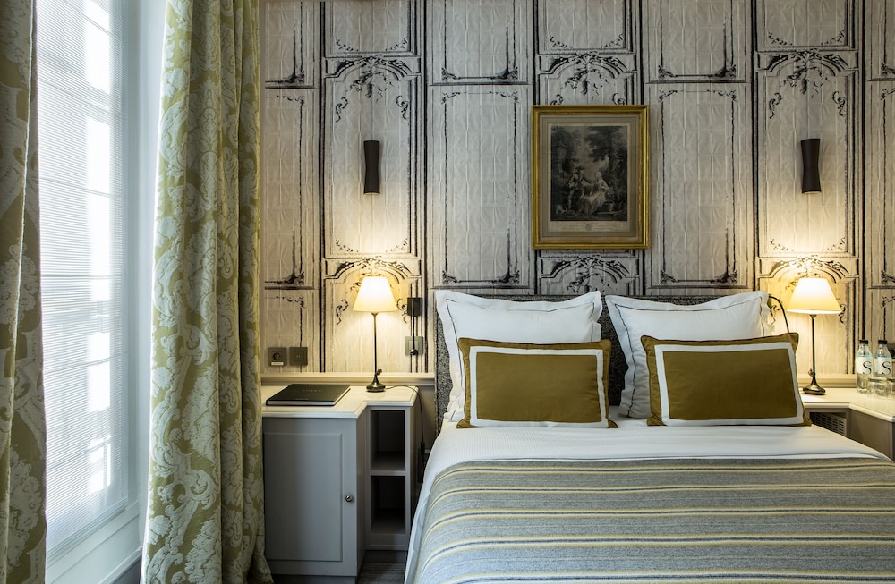 Habitación familiar comunicada del hotel Mansart. Foto 1