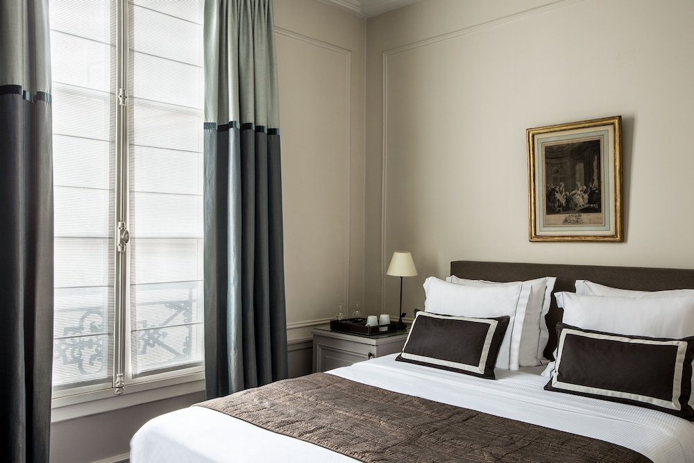 Habitación familiar deluxe comunicada del hotel Mansart