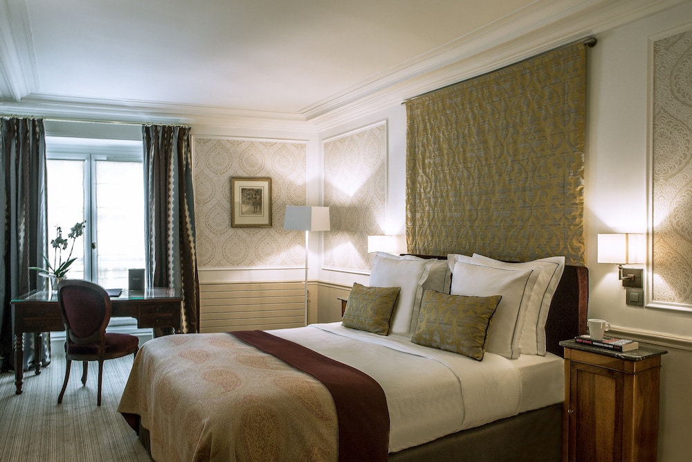 Habitación familiar deluxe comunicada del hotel Mansart. Foto 2