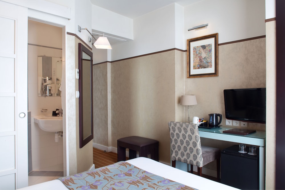 Habitación clásica del hotel Eiffel Seine. Foto 1