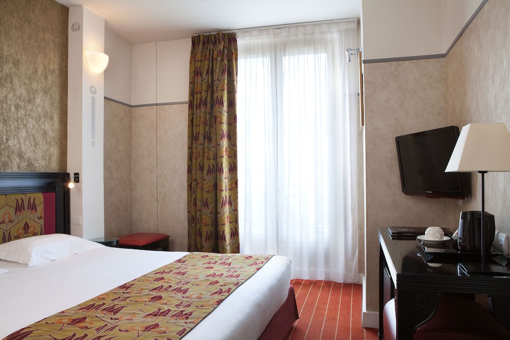 Habitación Club del hotel Eiffel Seine. Foto 2