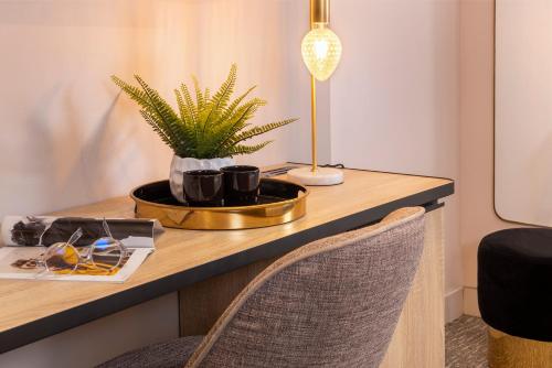Habitación Deluxe Clásica del hotel Nude Paris. Foto 2