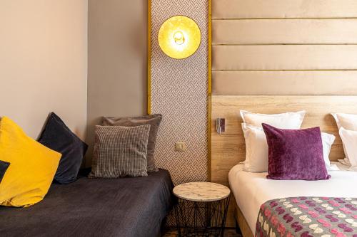 Habitación Triple del hotel Nude Paris. Foto 3