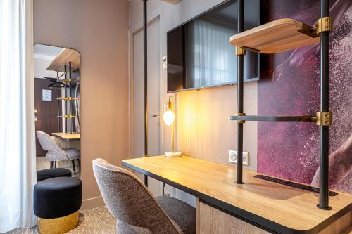 Habitación Triple del hotel Nude Paris. Foto 6