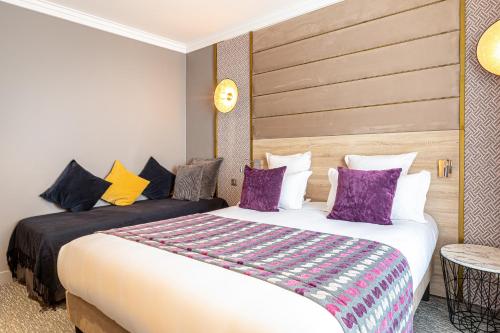 Habitación Triple del hotel Nude Paris. Foto 7