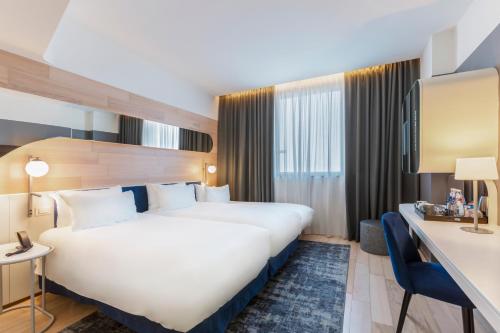 Habitación Triple del hotel Voco Milan - Fiere, An Ihg. Foto 3