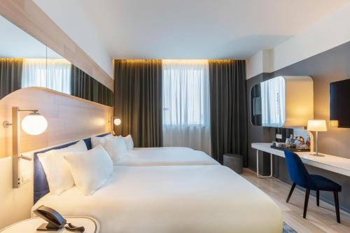 Habitación Triple del hotel Voco Milan - Fiere, An Ihg. Foto 4