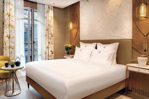 Habitación Doble Estándar del hotel La Demeure Montaigne. Foto 1