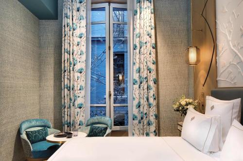 Habitación Doble Estándar del hotel La Demeure Montaigne. Foto 3