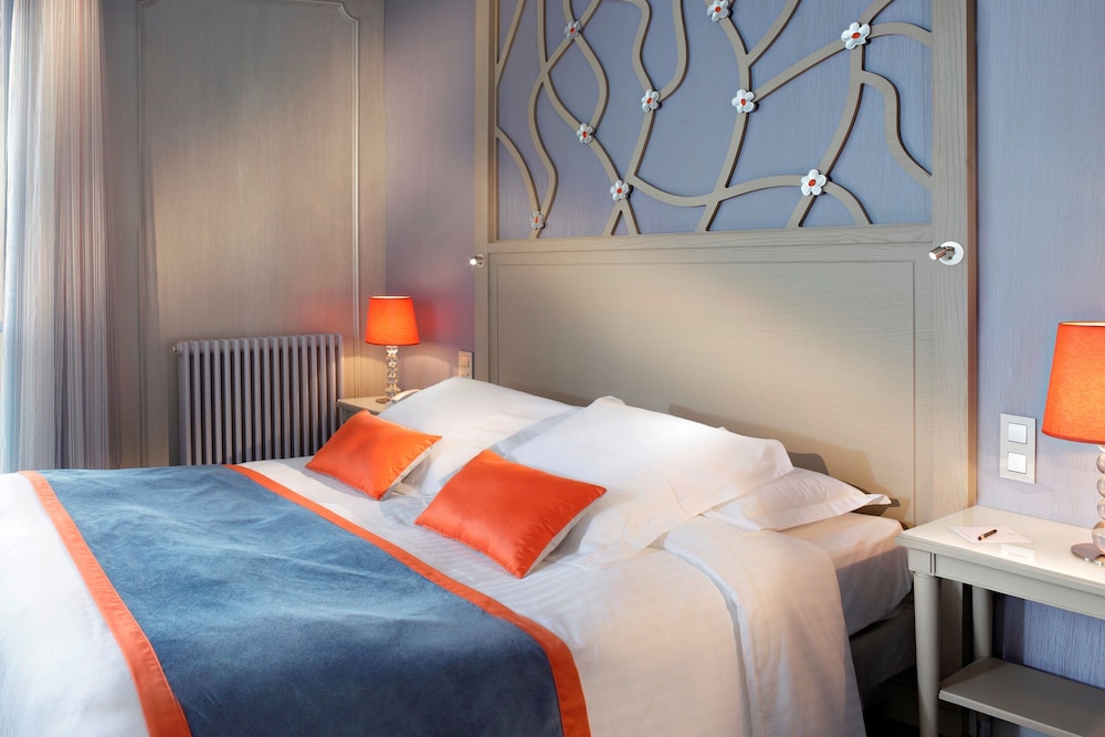 Habitación clásica del hotel Splendid Etoile. Foto 1