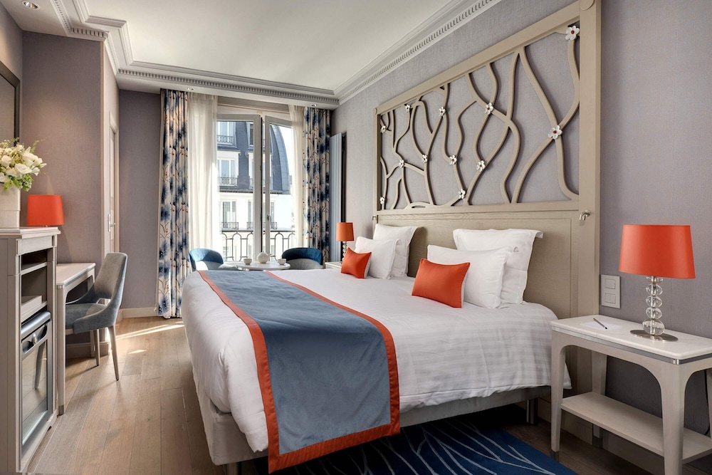 Habitación Clásica del hotel Rochester Champs Elysées. Foto 1