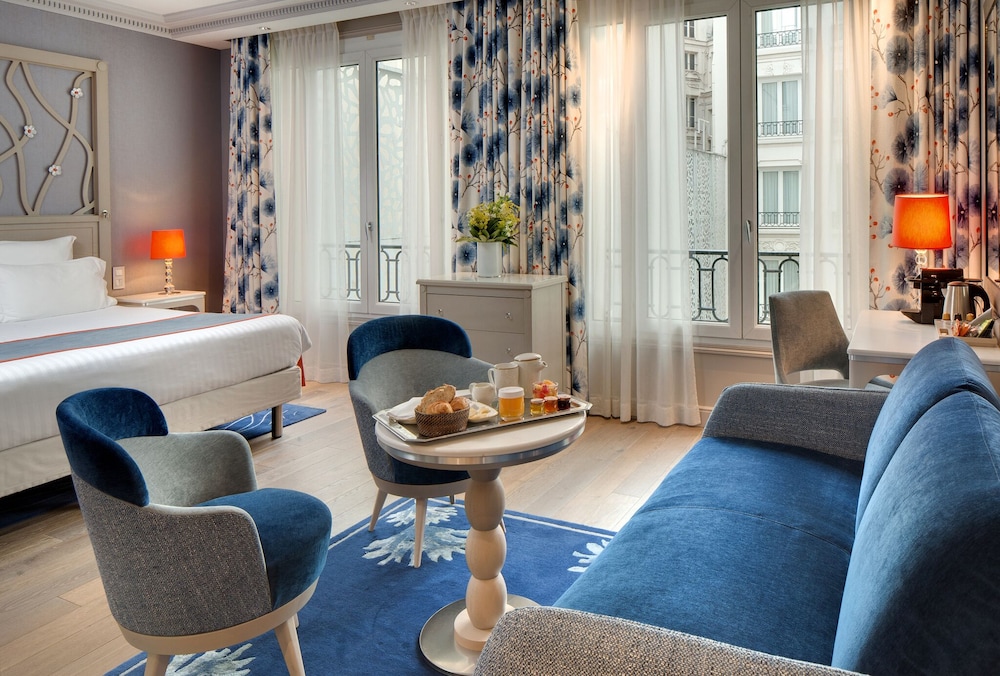 Habitación Deluxe del hotel Rochester Champs Elysées. Foto 3