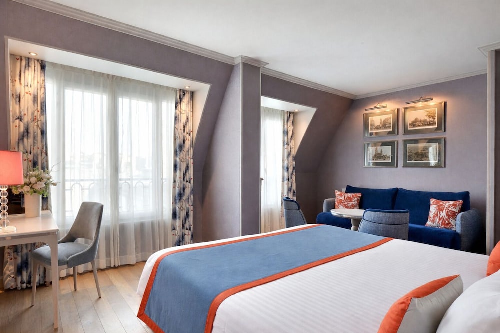 Habitación Deluxe del hotel Rochester Champs Elysées. Foto 6