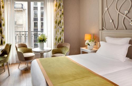 Habitación Privilege del hotel Rochester Champs Elysées. Foto 2