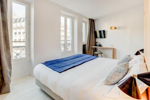 Habitación Doble Superior con vistas a la ciudad - 1 o 2 camas del hotel Montholon Paris. Foto 3