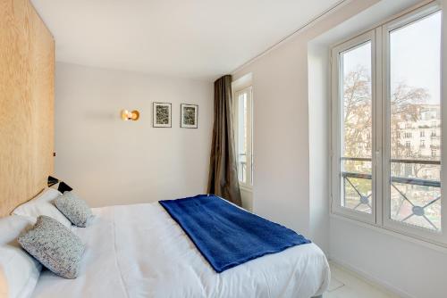 Habitación Doble Superior con vistas a la ciudad - 1 o 2 camas del hotel Montholon Paris. Foto 4