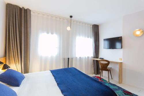 Habitación Individual del hotel Montholon Paris. Foto 5