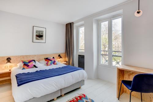 Habitación Triple del hotel Montholon Paris. Foto 3