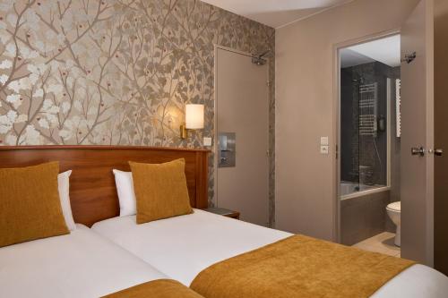 Habitación Doble - 2 camas del hotel Timhotel Opéra Madeleine. Foto 4