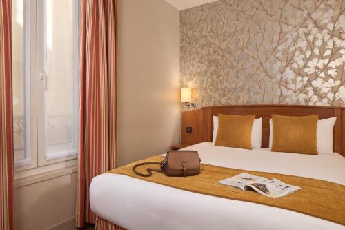 Habitación Doble Confort del hotel Timhotel Opéra Madeleine. Foto 4