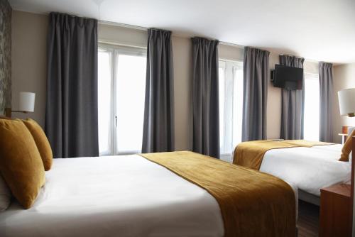 Habitación Familiar del hotel Timhotel Opéra Madeleine. Foto 1