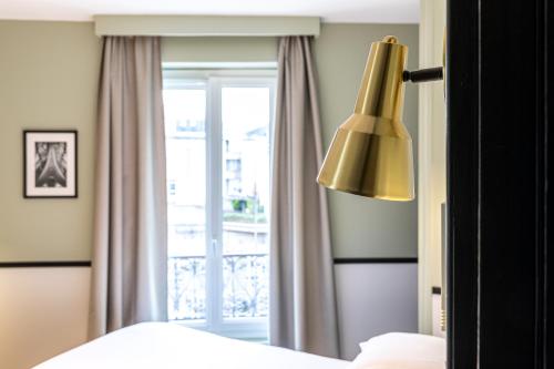 Habitación Clásica del hotel De L'aqueduc. Foto 1