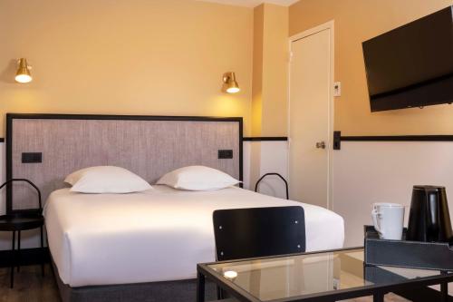 Habitación Clásica del hotel De L'aqueduc. Foto 11