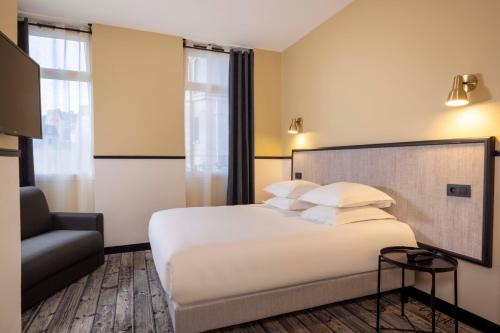 Habitación Triple Deluxe del hotel De L'aqueduc. Foto 13