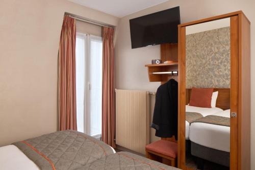 Habitación Doble Confort - 2 camas del hotel Timhotel Paris Gare Montparnasse. Foto 2