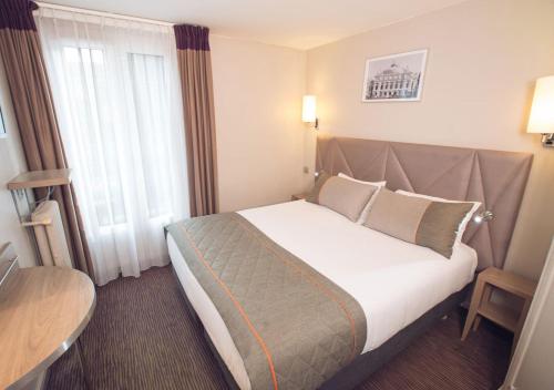 Habitación Doble Superior del hotel Timhotel Paris Gare Montparnasse. Foto 1