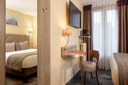 Habitación Doble Superior del hotel Timhotel Paris Gare Montparnasse. Foto 4