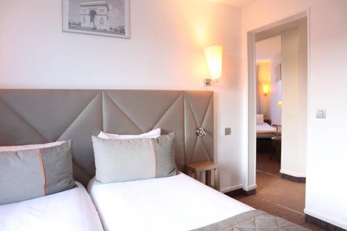 Habitación Triple Superior del hotel Timhotel Paris Gare Montparnasse
