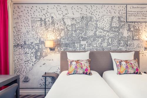 Habitación Twin Clásica del hotel Mercure Paris Tour Eiffel Grenelle. Foto 3