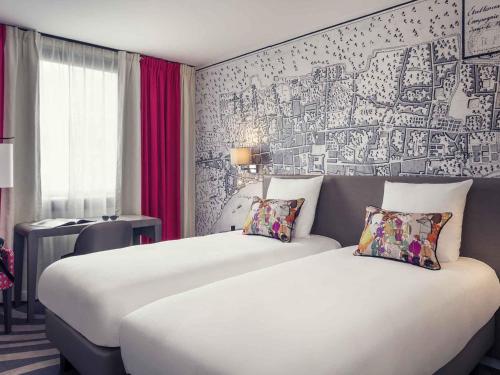 Habitación Twin Clásica del hotel Mercure Paris Tour Eiffel Grenelle. Foto 8