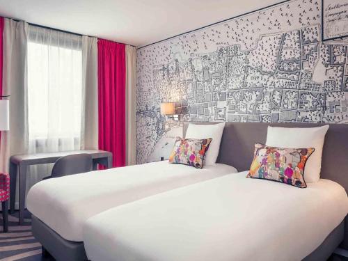 Habitación Twin Clásica del hotel Mercure Paris Tour Eiffel Grenelle. Foto 9