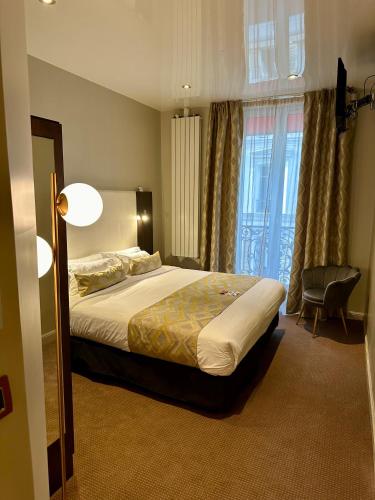 Habitación Doble Clásica del hotel BEST WESTERN EMPIRE ELYSEES. Foto 18