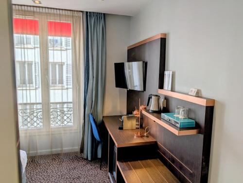 Habitación Individual Clásica del hotel BEST WESTERN EMPIRE ELYSEES. Foto 21