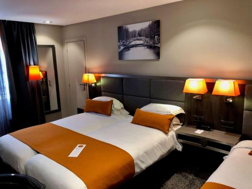 Habitación Familiar del hotel BEST WESTERN EMPIRE ELYSEES. Foto 1