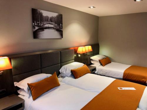 Habitación Familiar del hotel BEST WESTERN EMPIRE ELYSEES. Foto 4