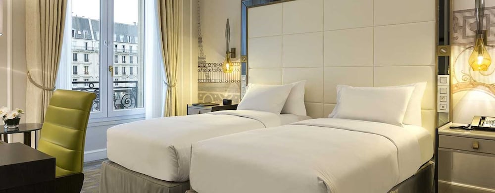 Habitación Deluxe con 2 camas individuales del hotel HILTON OPERA PARIS. Foto 1