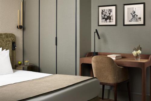 Habitación Deluxe del hotel NH Paris Champs-Elysées. Foto 3